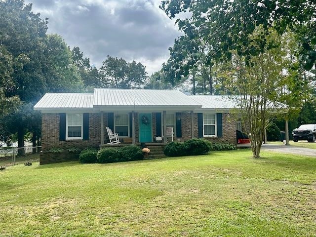 40 Lewter Road Crump, TN 38327 - Photo 24 of 25 Single story home with a front lawn and covered porch