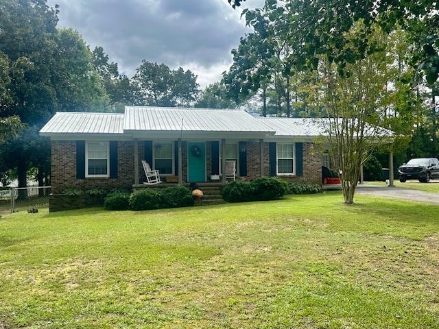 40 Lewter Road Crump, TN 38327 - Photo 25 of 25 Single story home with a carport, a porch, and a front yard