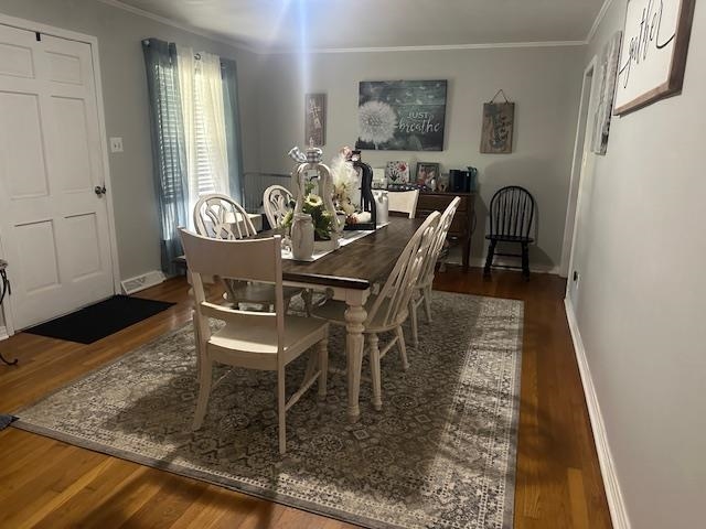 40 Lewter Road Crump, TN 38327 - Photo 9 of 25 Dining space with ornamental molding and dark wood-type flooring