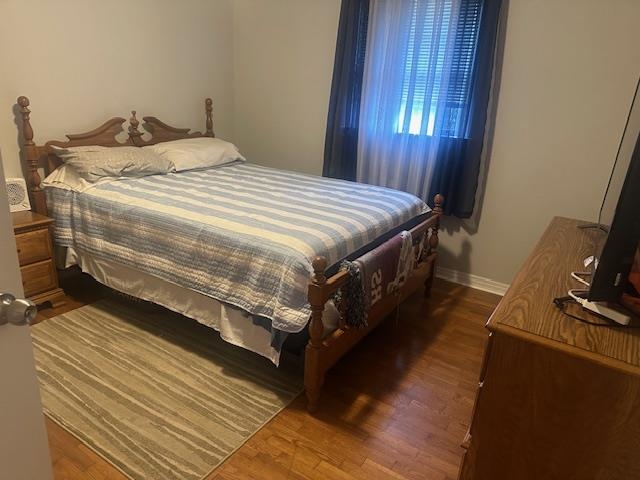 40 Lewter Road Crump, TN 38327 - Photo 10 of 25 Bedroom featuring dark wood-type flooring