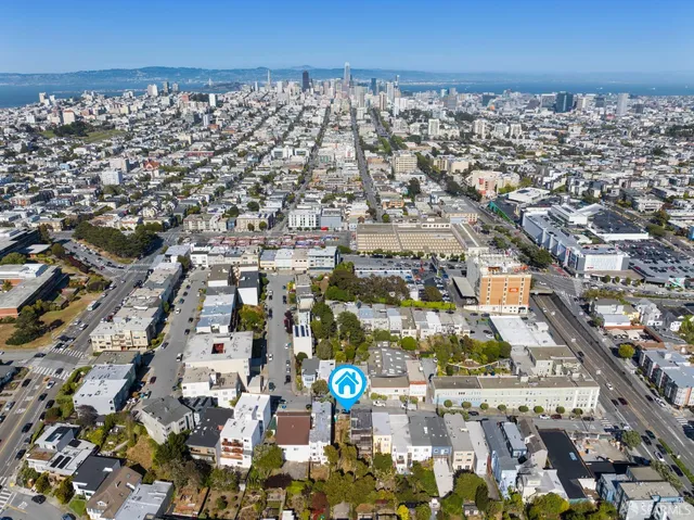 a view of a street with cars