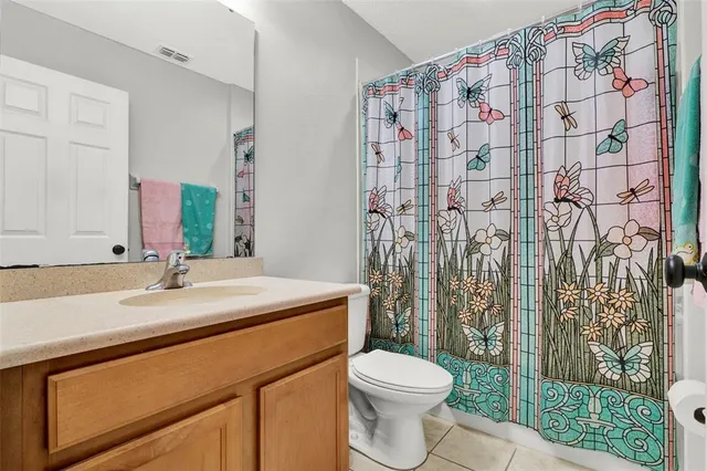 a bathroom with a sink and toilet