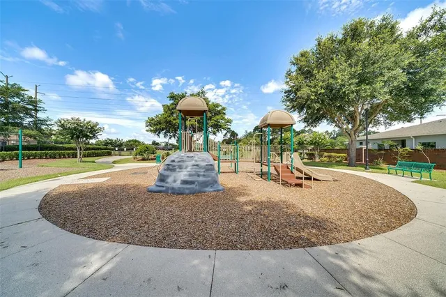 a view of a park with swings
