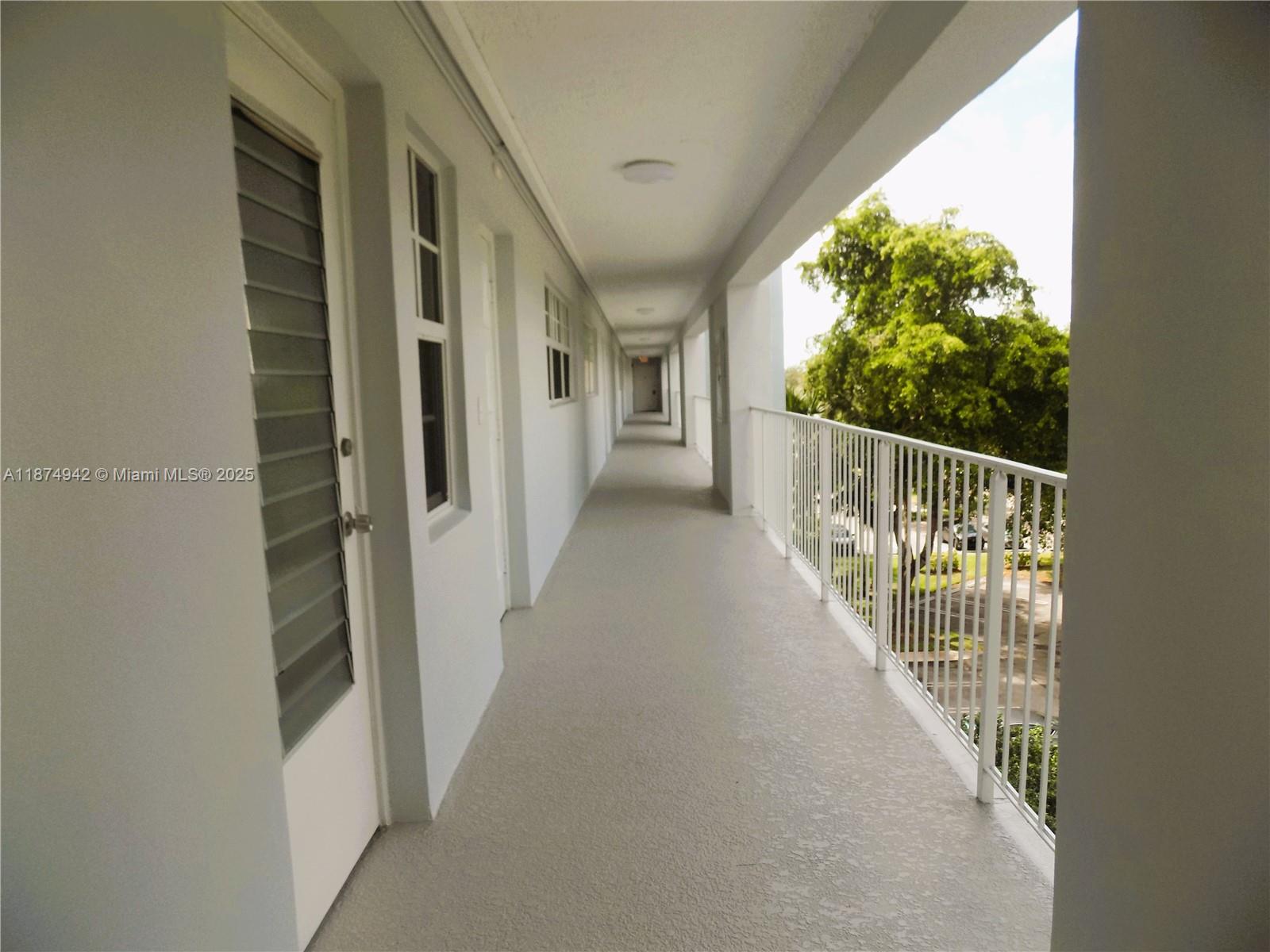 3100 North Course Lane, Unit 502 Pompano Beach, FL 33069 - Photo 13 of 32 a view of a porch