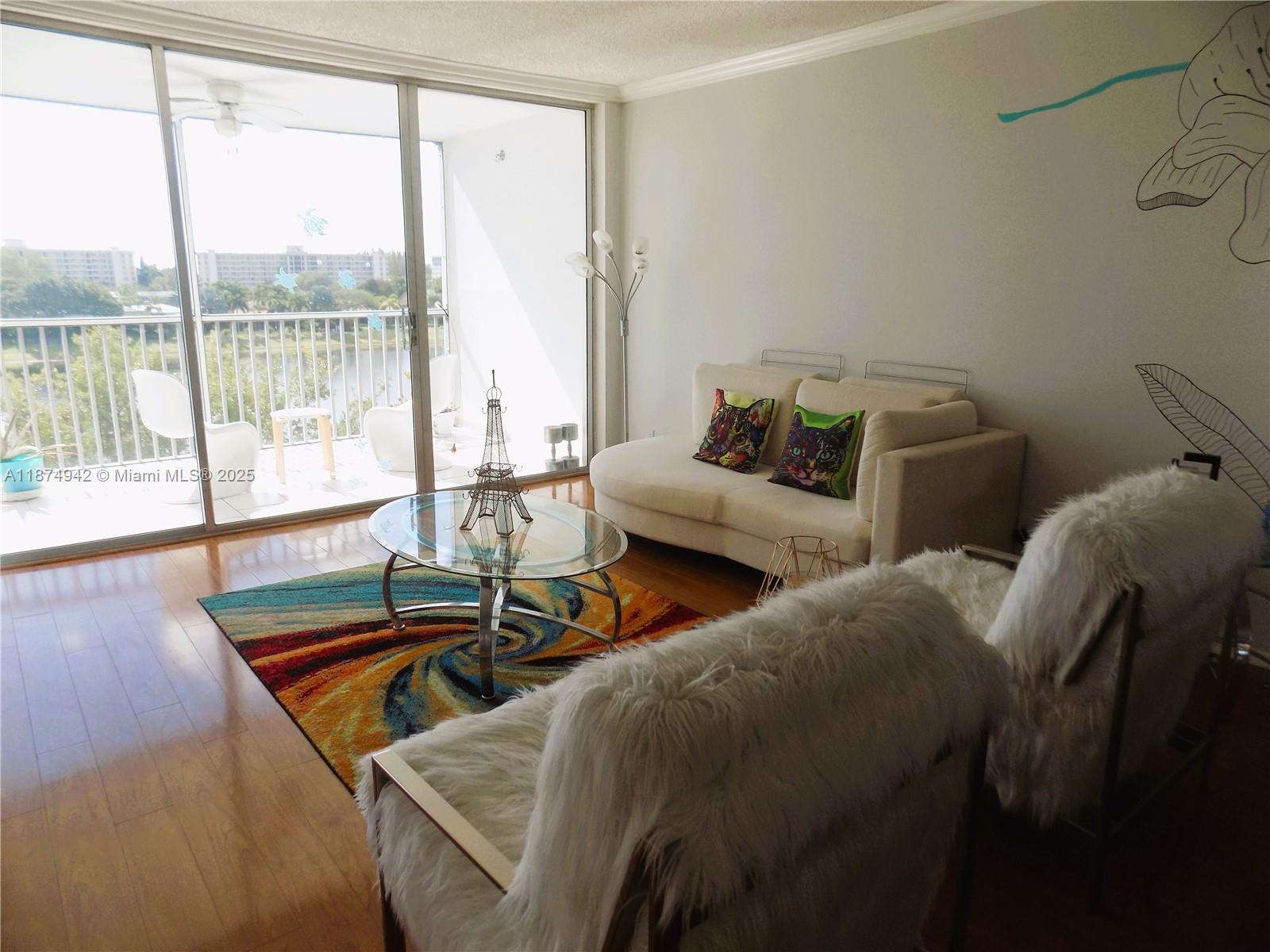 3100 North Course Lane, Unit 502 Pompano Beach, FL 33069 - Photo 14 of 32 a bedroom with two beds and large window