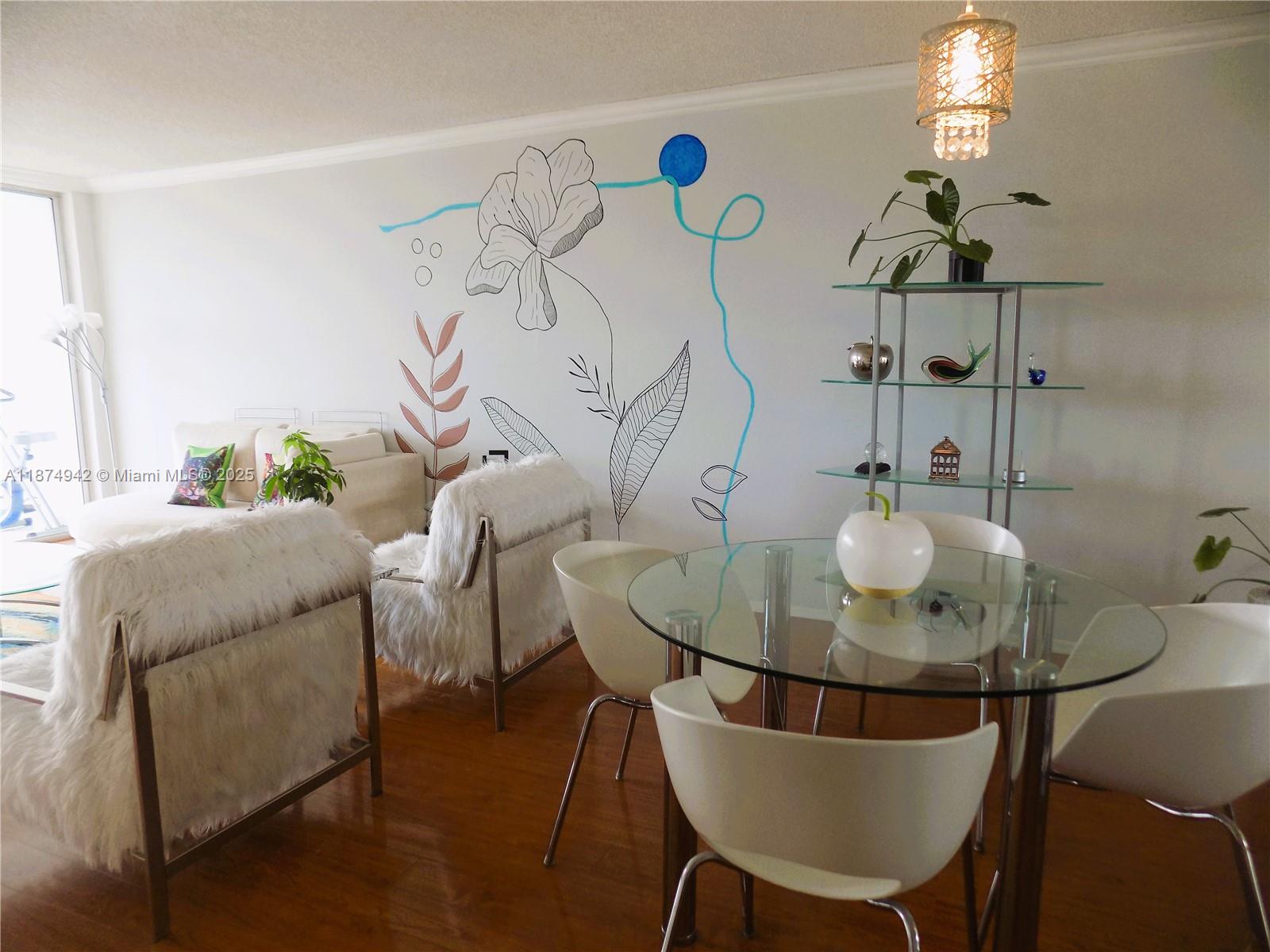 3100 North Course Lane, Unit 502 Pompano Beach, FL 33069 - Photo 15 of 32 a view of a dining room with furniture and chandelier