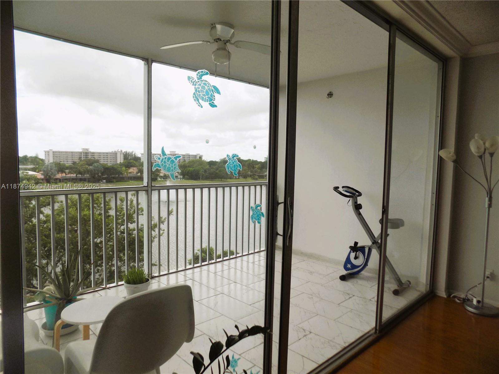 3100 North Course Lane, Unit 502 Pompano Beach, FL 33069 - Photo 25 of 32 a view of a balcony with chair