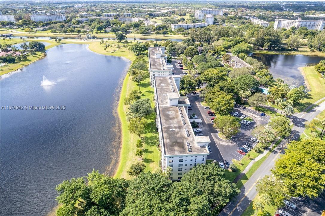 3100 North Course Lane, Unit 502 Pompano Beach, FL 33069 - Photo 8 of 32 an aerial view of residential houses with outdoor space and swimming pool
