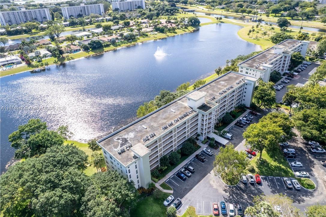 3100 North Course Lane, Unit 502 Pompano Beach, FL 33069 - Photo 9 of 32 a view of a yard with outdoor space
