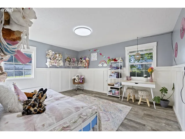 a bedroom with a bed and cabinets