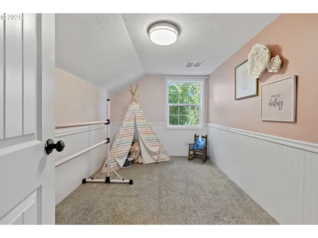 a dining room with a window and a table