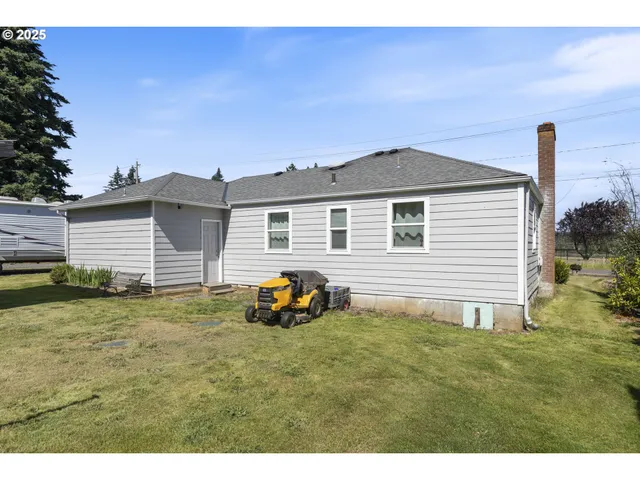an aerial view of a house with a swimming pool