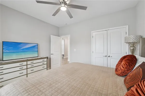 a bathroom with a shower and a sink