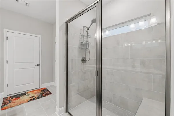 a view of a dining room with furniture wooden floor and chandelier