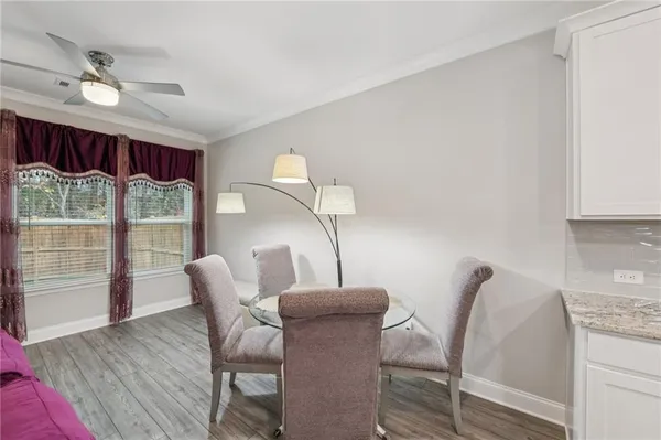 a bedroom with bed and window