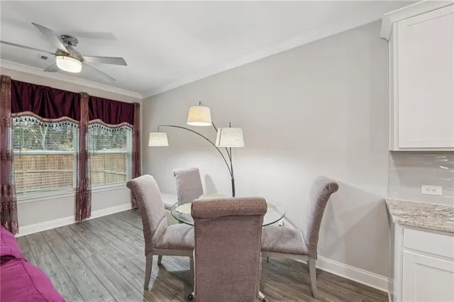 a bedroom with bed and window