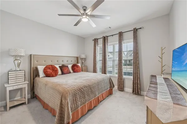 a bedroom with a bed and a cabinets