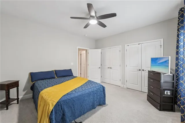 a outdoor space with a table and chairs