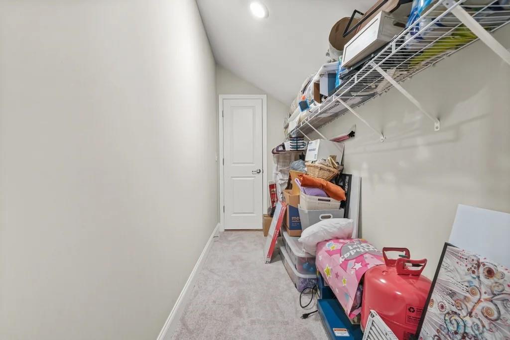 567 Barlow Place Grayson, GA 30017 - Photo 64 of 65 a bed room with a bed and a couch