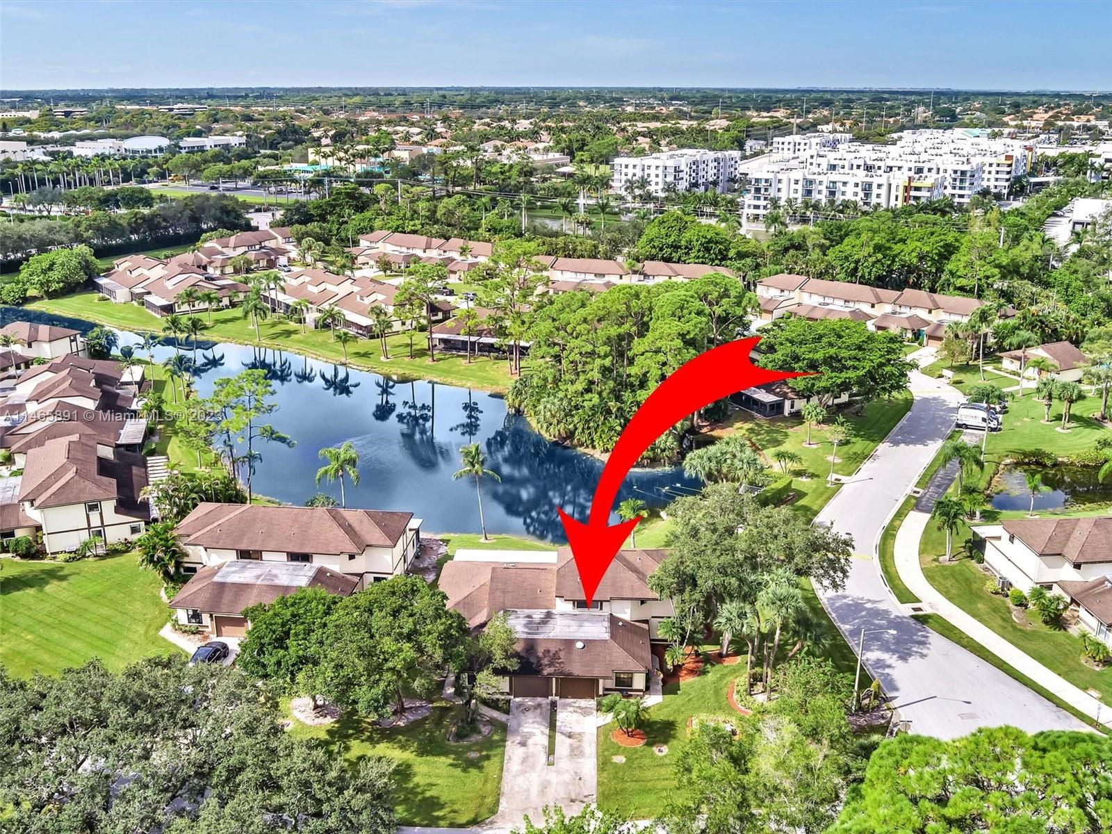 20889 South Boca Ridge Drive South, Unit 20889 Boca Raton, FL 33428 - Photo 54 of 66 an aerial view of residential houses with outdoor space
