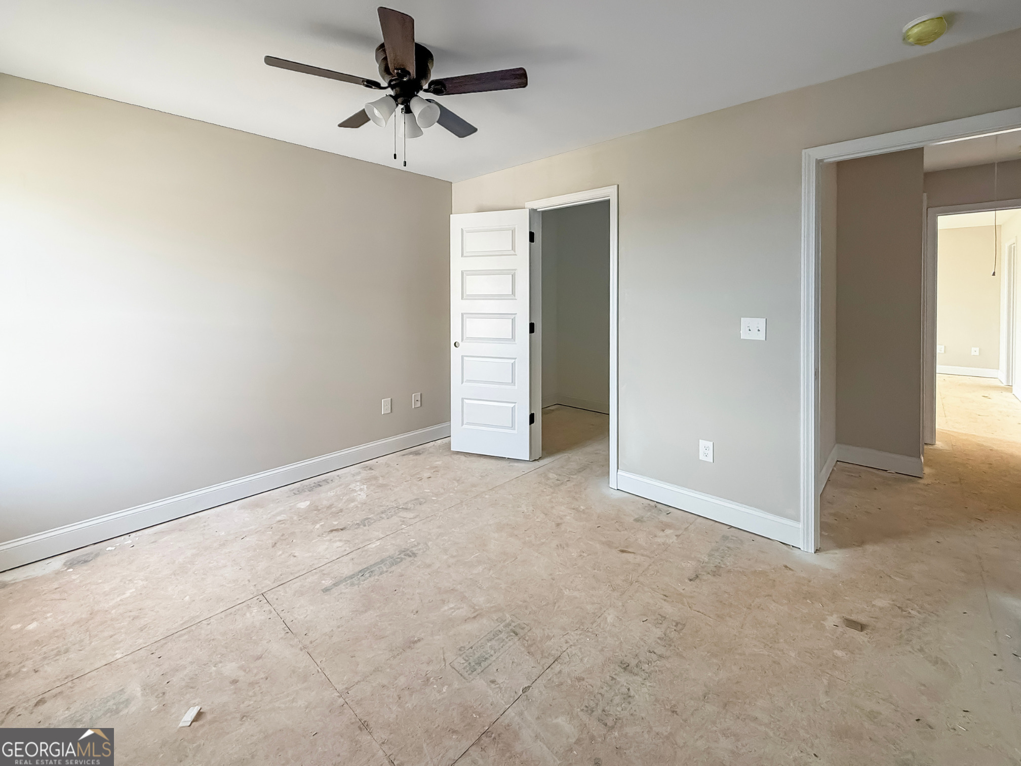 206 Sutton Drive Perry, GA 31069 - Photo 18 of 27 an empty room with closet and windows