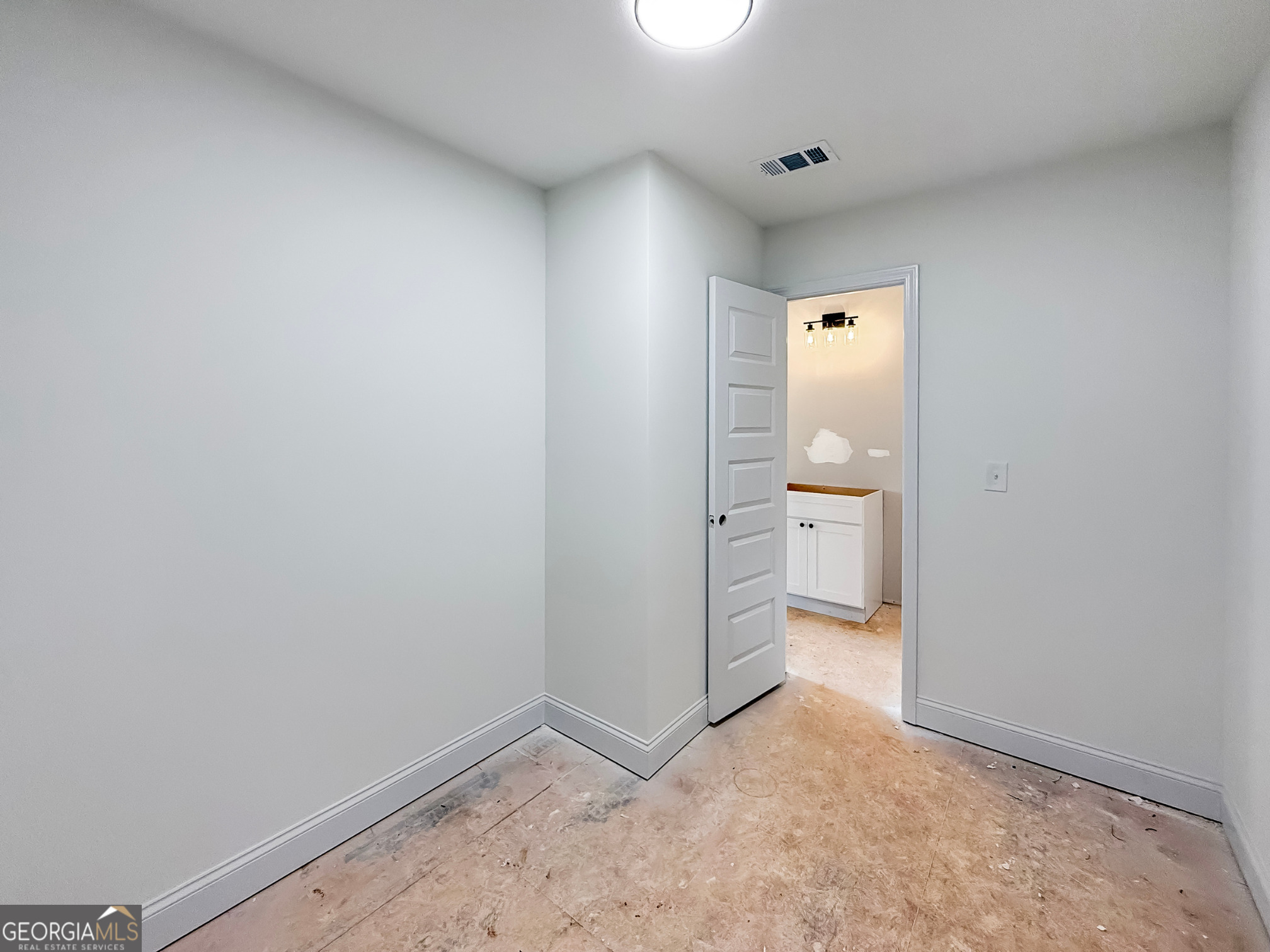 206 Sutton Drive Perry, GA 31069 - Photo 24 of 27 a view of a hallway with a room