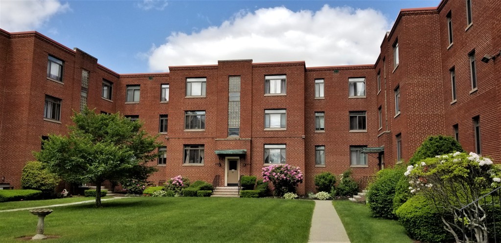 a front view of a multi story building