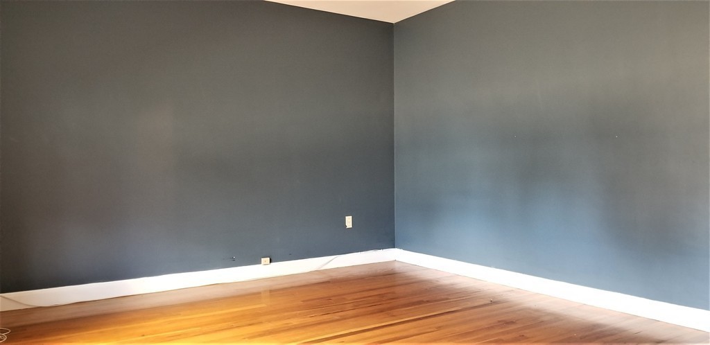 14 Ashland Street, Unit 2R Worcester, MA 01609 - Photo 12 of 16 a view of empty room with wooden floor