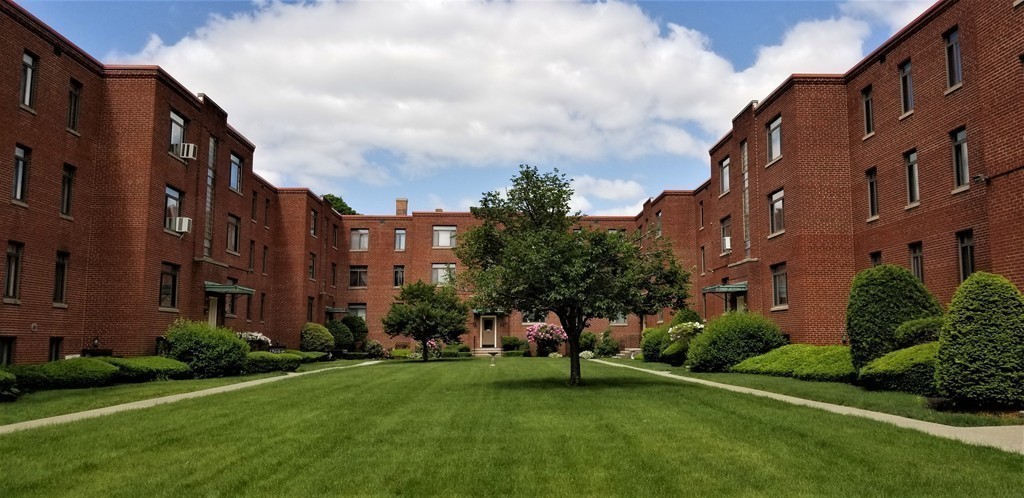 14 Ashland Street, Unit 2R Worcester, MA 01609 - Photo 16 of 16 a view of a building with a yard