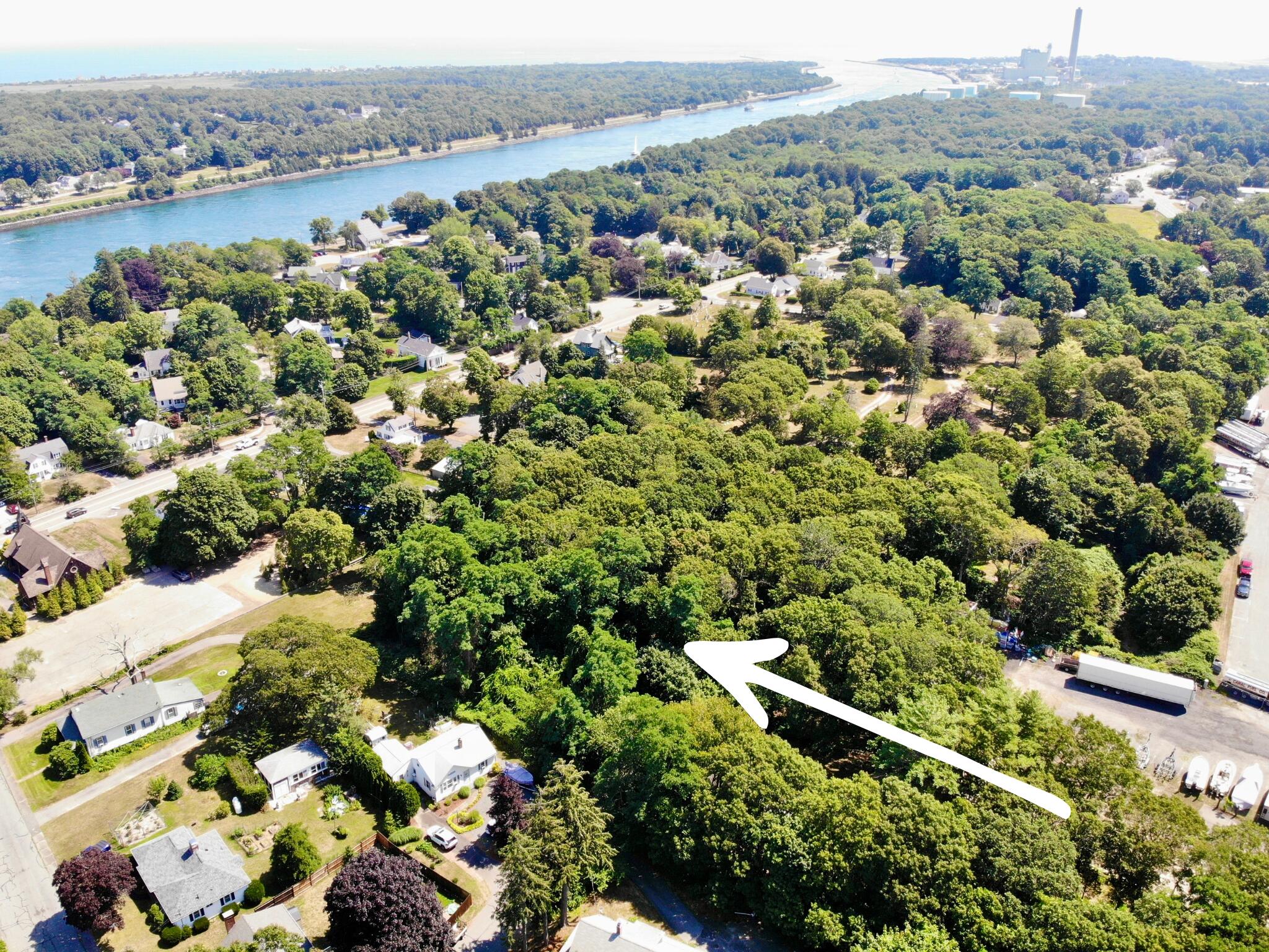 an aerial view of a residential houses and lake view