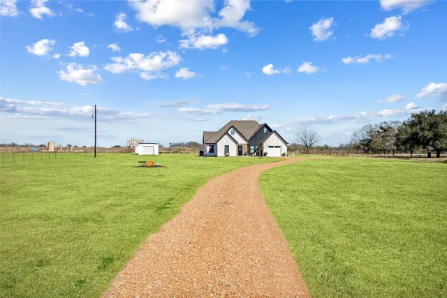 a view of swimming pool from a garden