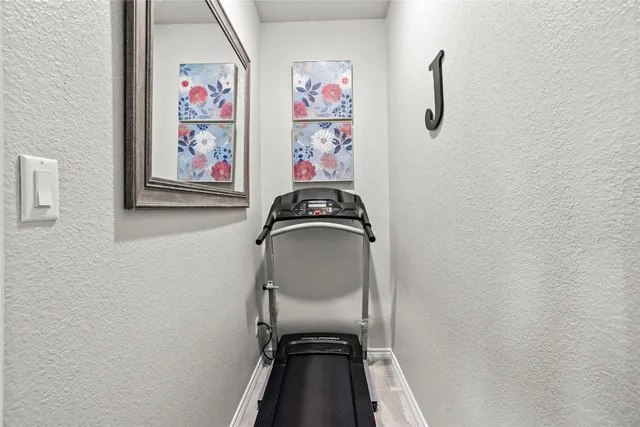 a view of a hallway with a workspace