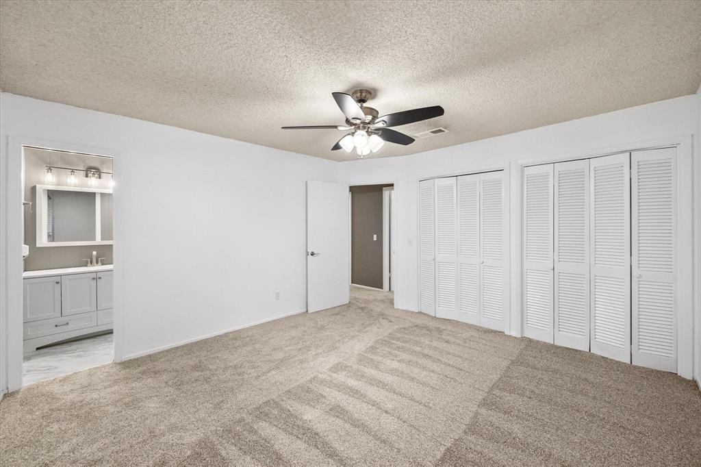 536 Robindale Lane Fairfield, TX 75840 - Photo 25 of 38 a view of an empty room with a ceiling fan