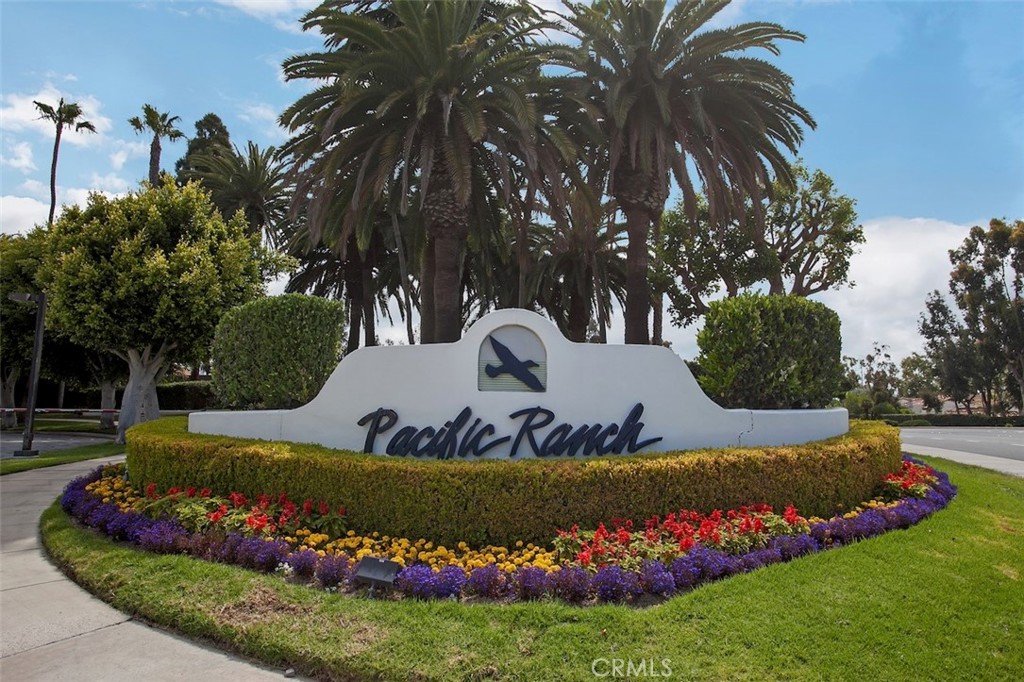 19451 Pompano Lane, Unit 110 Huntington Beach, CA 92648 - Photo 43 of 54 a view of a garden with flowers and trees