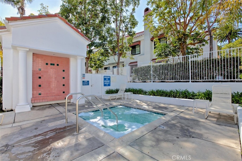 19451 Pompano Lane, Unit 110 Huntington Beach, CA 92648 - Photo 47 of 54 a backyard of a house