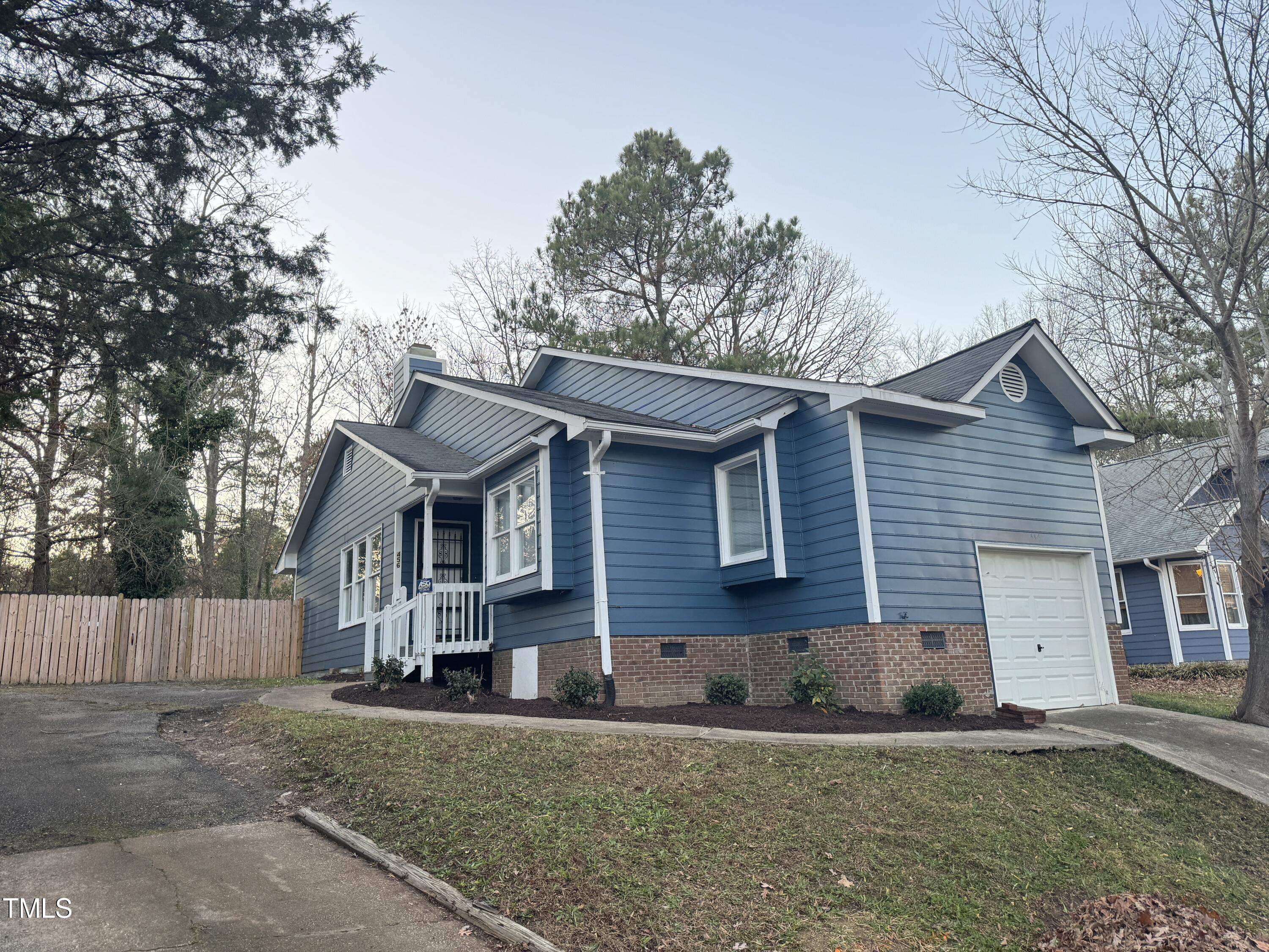 456 Dickens Drive Raleigh, NC 27610 - Photo 1 of 33 front view of a house with a yard