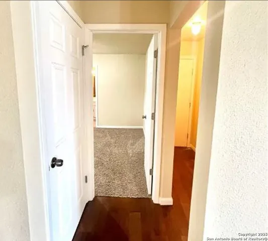 a view of walk in closet with window