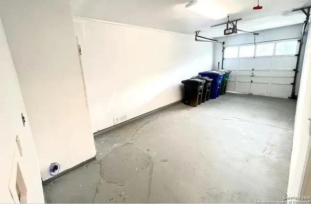 a view of storage and utility room with stairs