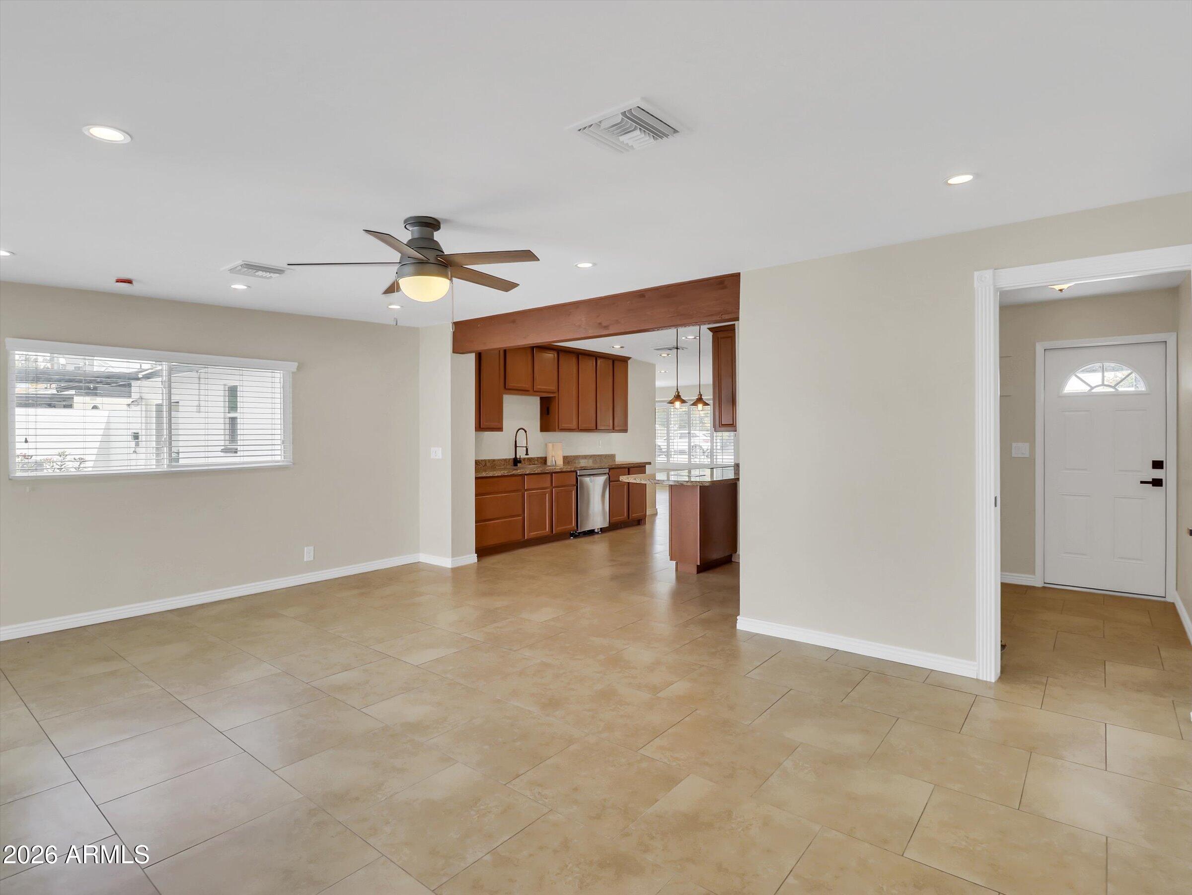 6036 North 8th Street Phoenix, AZ 85014 - Photo 15 of 31 a view of a kitchen with a sink and a refrigerator