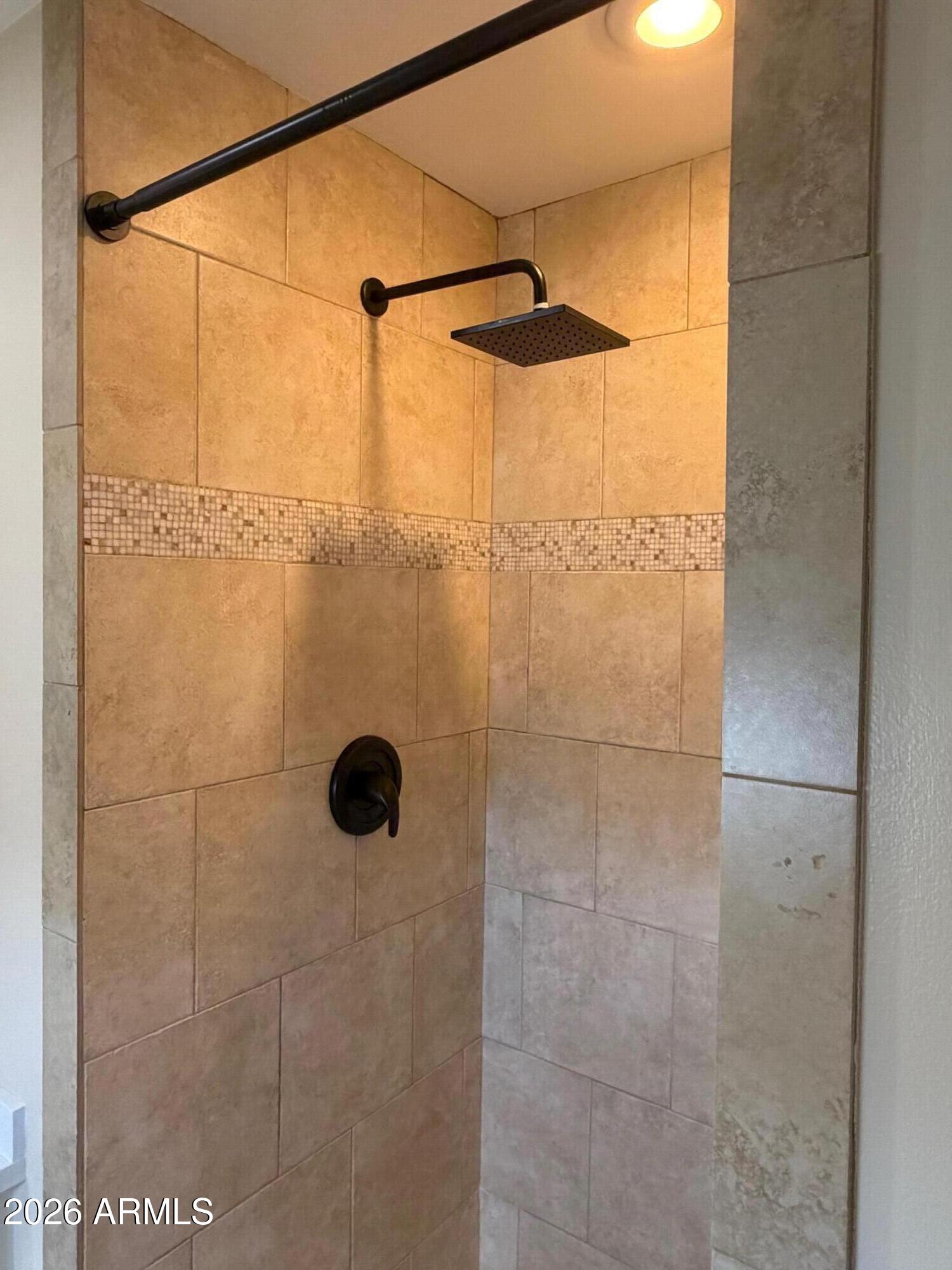 6036 North 8th Street Phoenix, AZ 85014 - Photo 21 of 37 a bathroom with a shower