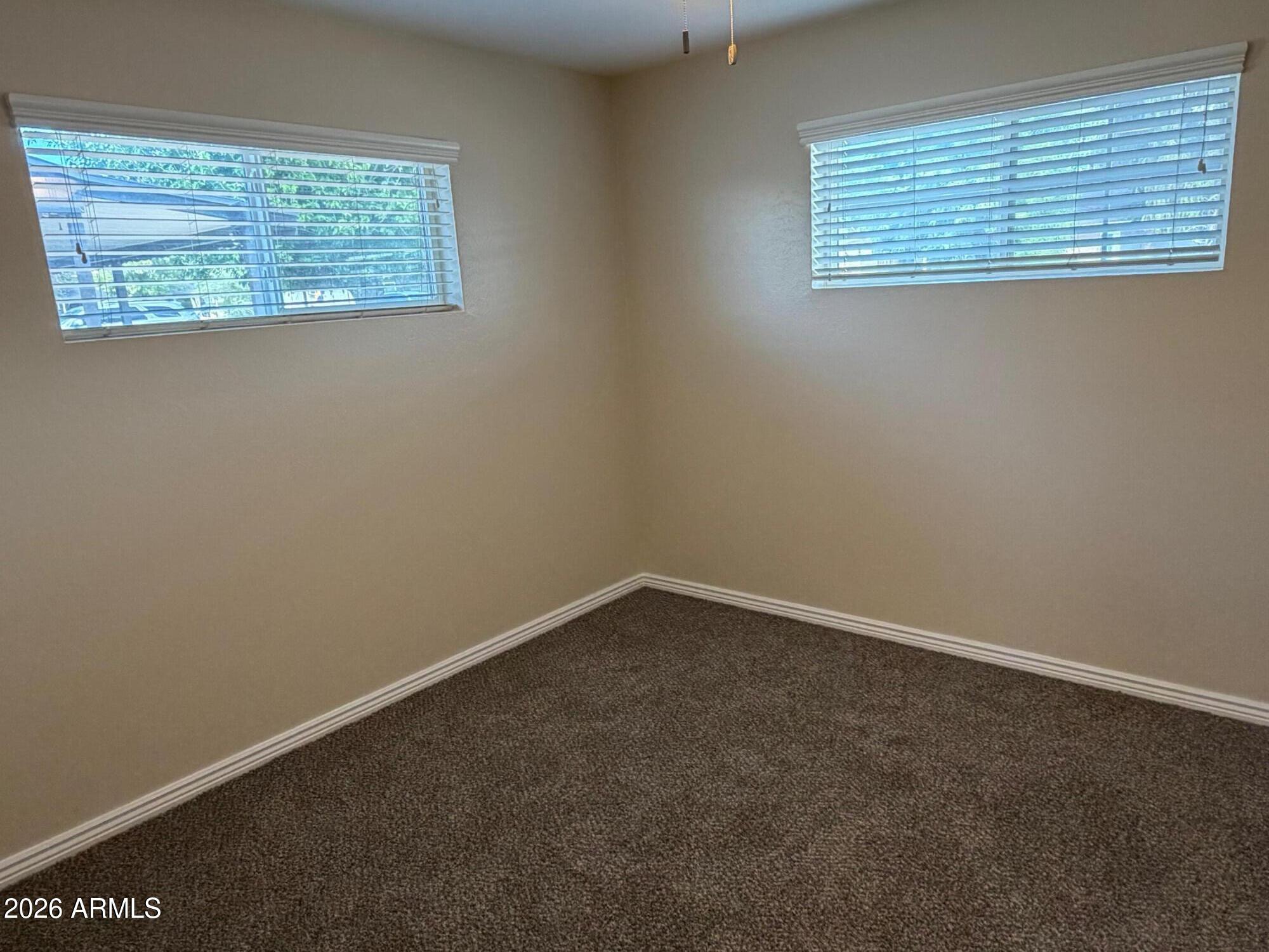 6036 North 8th Street Phoenix, AZ 85014 - Photo 26 of 37 an empty room with a window