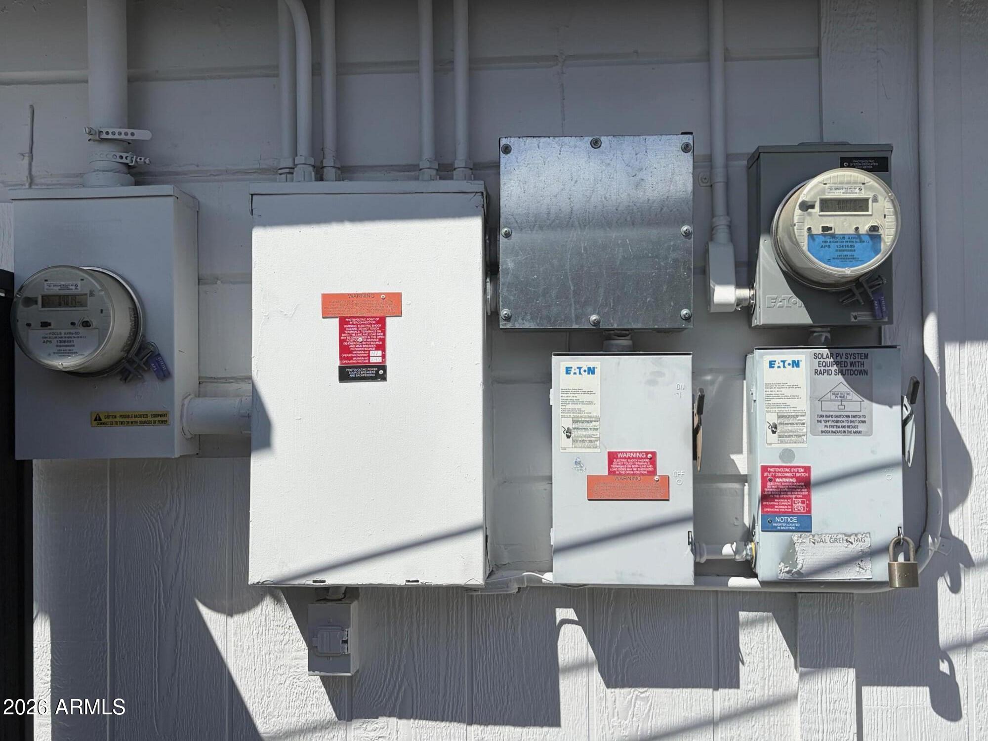 6036 North 8th Street Phoenix, AZ 85014 - Photo 33 of 37 a living room with a couch and cabinets