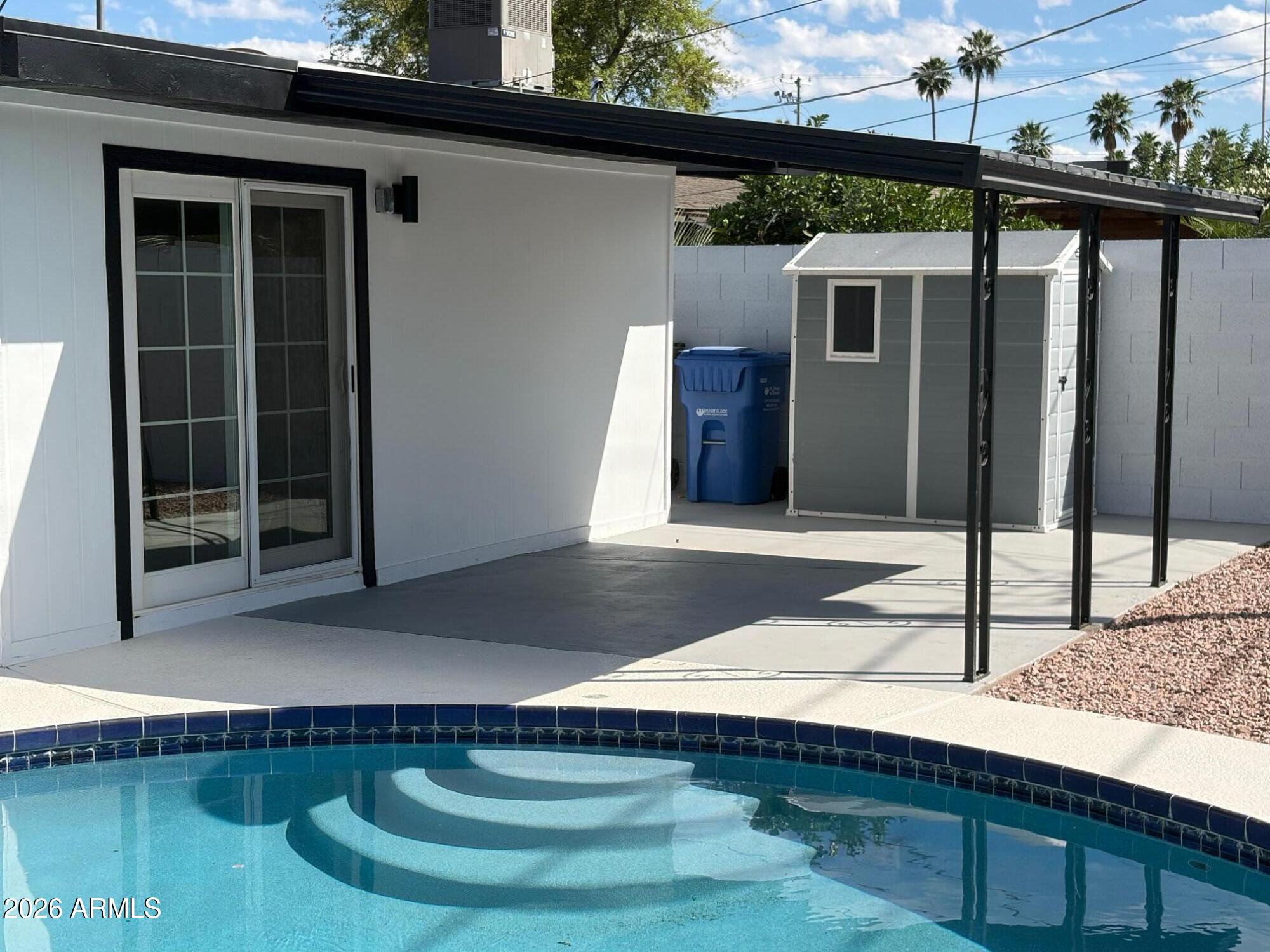 6036 North 8th Street Phoenix, AZ 85014 - Photo 6 of 37 a front view of a house with balcony