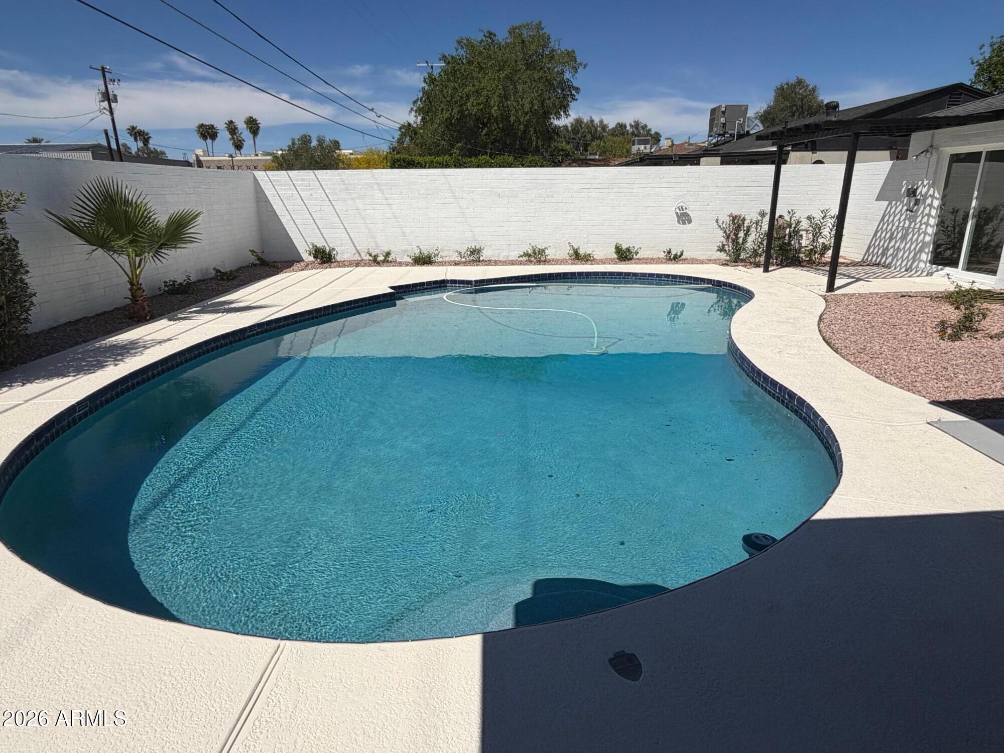 6036 North 8th Street Phoenix, AZ 85014 - Photo 7 of 37 a view of a swimming pool
