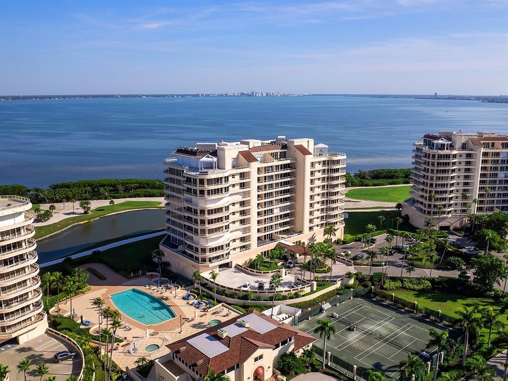 3040 Grand Bay Boulevard, Unit 213 Longboat Key, FL 34228 - Photo 2 of 44 a view of a balcony with chairs
