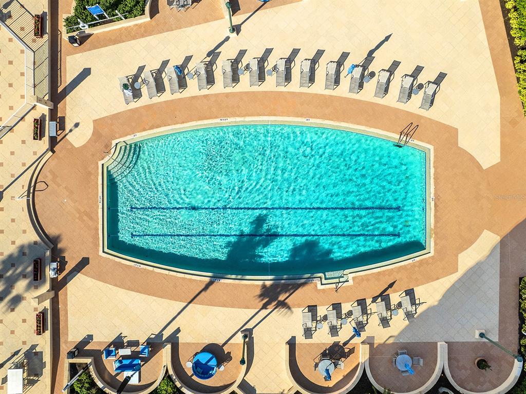 3040 Grand Bay Boulevard, Unit 213 Longboat Key, FL 34228 - Photo 35 of 44 a street sign that is on a street