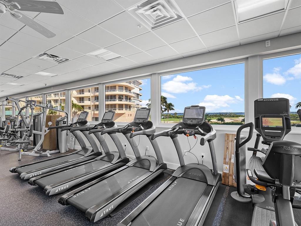 3040 Grand Bay Boulevard, Unit 213 Longboat Key, FL 34228 - Photo 38 of 44 a view of a room with gym equipment