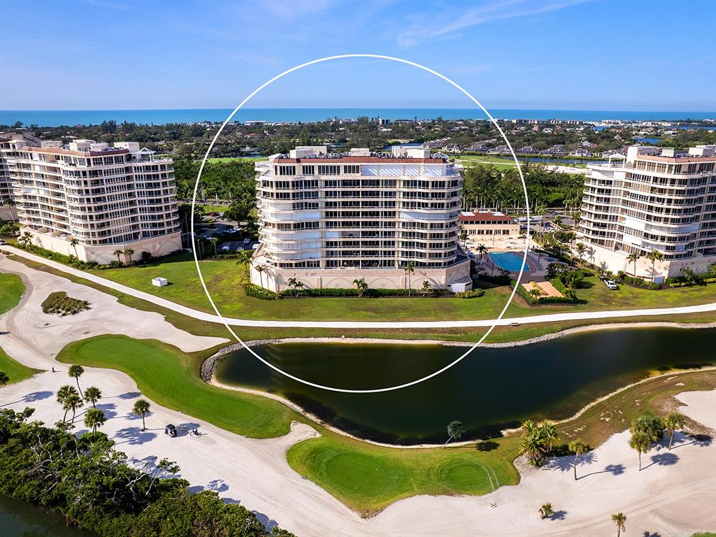 3040 Grand Bay Boulevard, Unit 213 Longboat Key, FL 34228 - Photo 42 of 44 a view of a tennis court