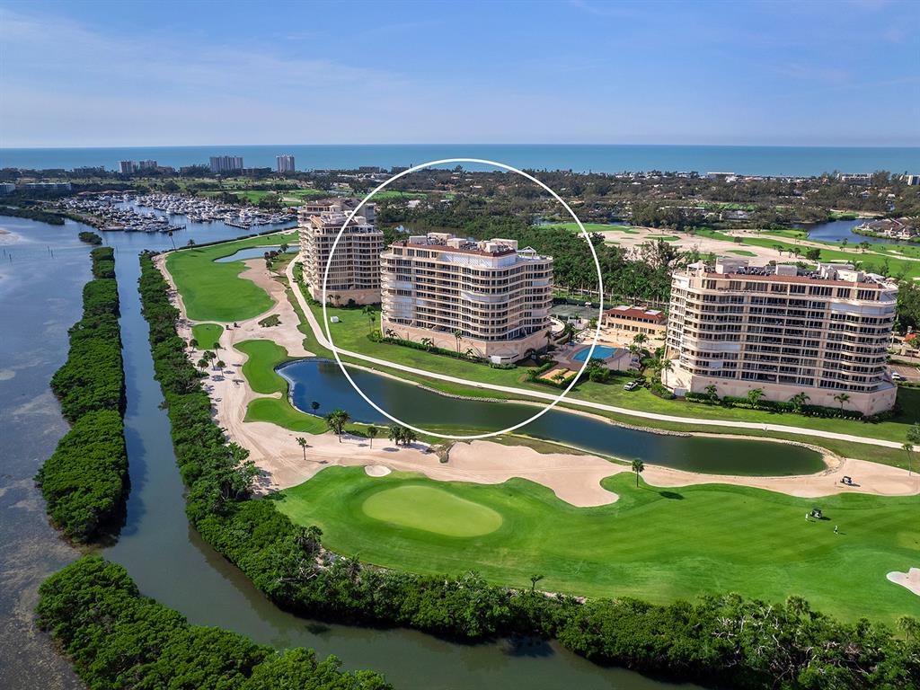 3040 Grand Bay Boulevard, Unit 213 Longboat Key, FL 34228 - Photo 43 of 44 an aerial view of a house
