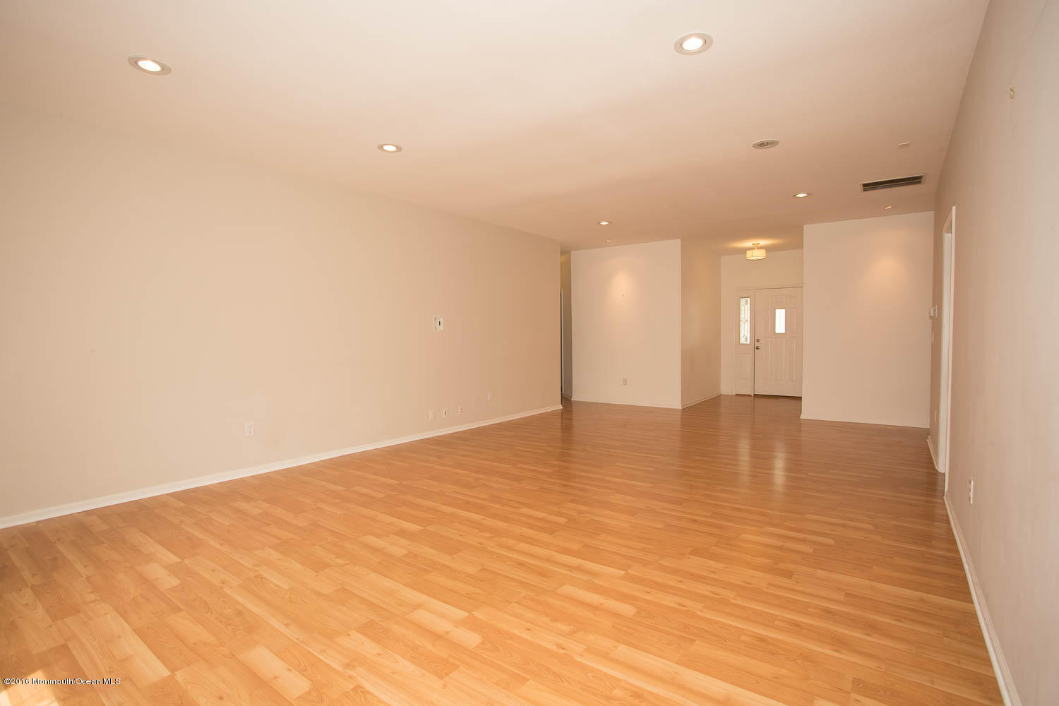 157 Cruise Road Manahawkin, NJ 08050 - Photo 3 of 14 a view of empty room with wooden floor